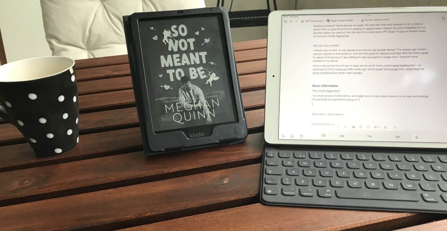 Photo showing a coffee cup, Kindle and an iPad.