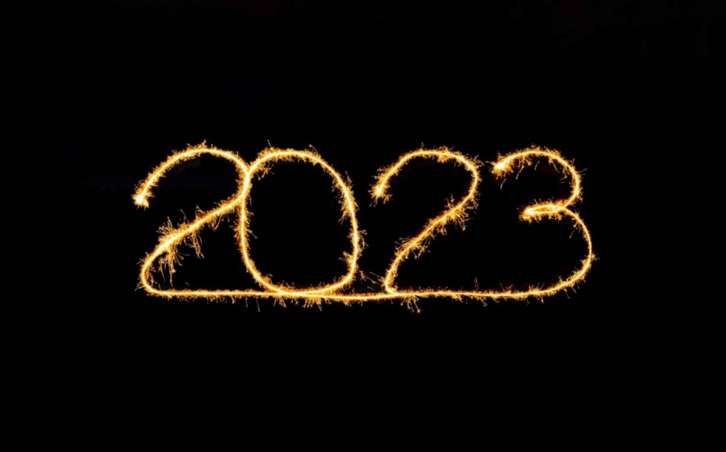 2023 written as a firework text on a black background.