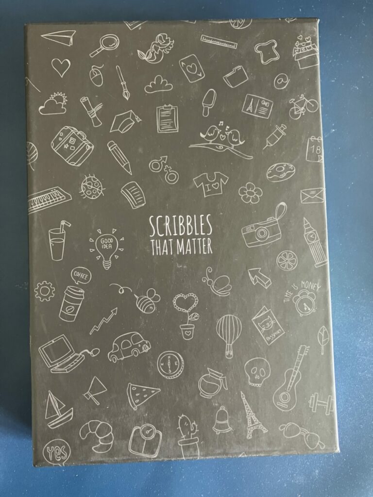 Front side of packaging for a Scribbles That Matter notebook