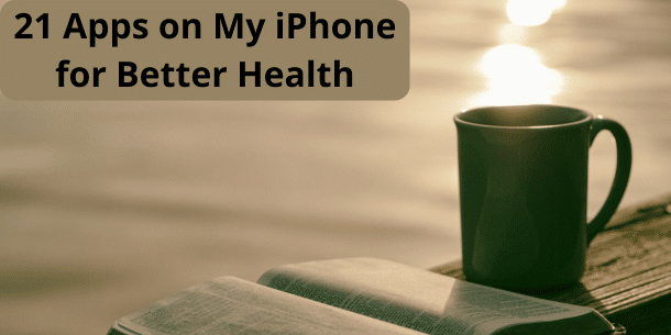 Image of cup and book near water and the text 21 Apps on My iPhone for Better Health displayed